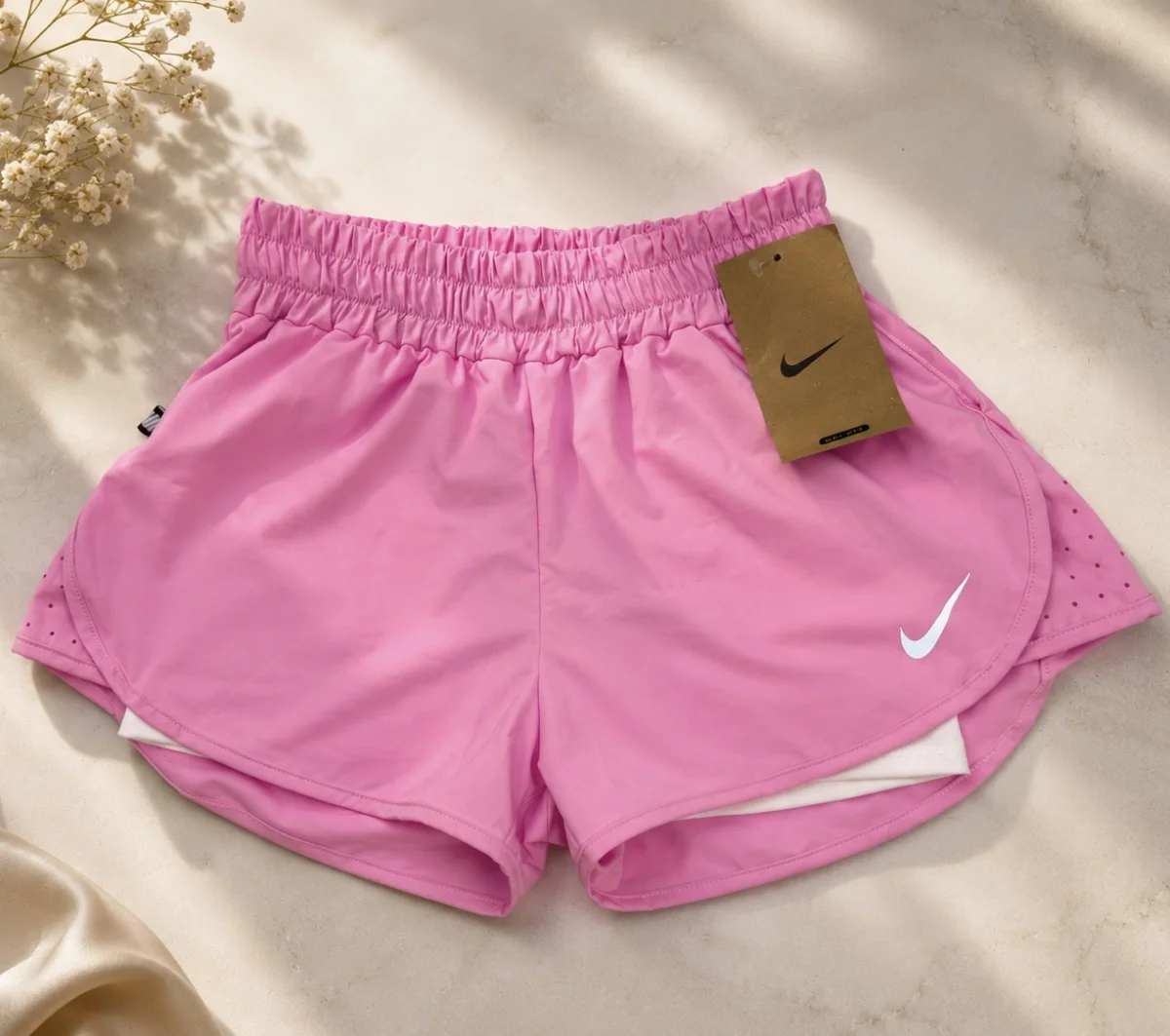 Pantaloneta deportiva rosa