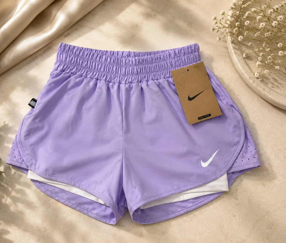 Pantaloneta deportiva Lila